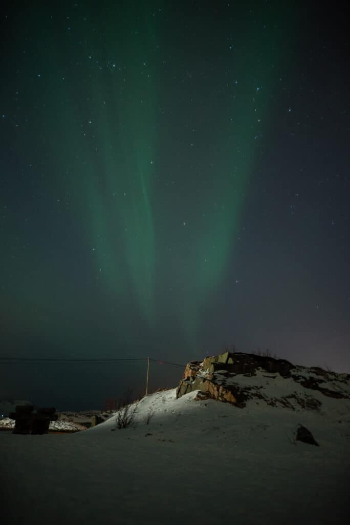 Northern lights dancing in the sky of Tromso, Norway. 